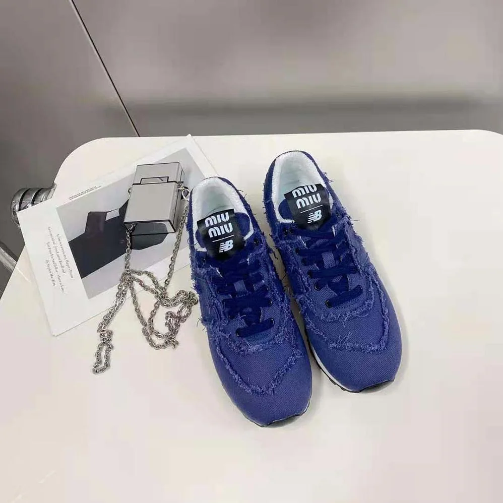 Miu Miu New Balance 574 x Miu Miu Denim Sneakers for Women in Navy Miu Miu New Balance 574 x Miu Miu Denim Sneakers for Women in Navy