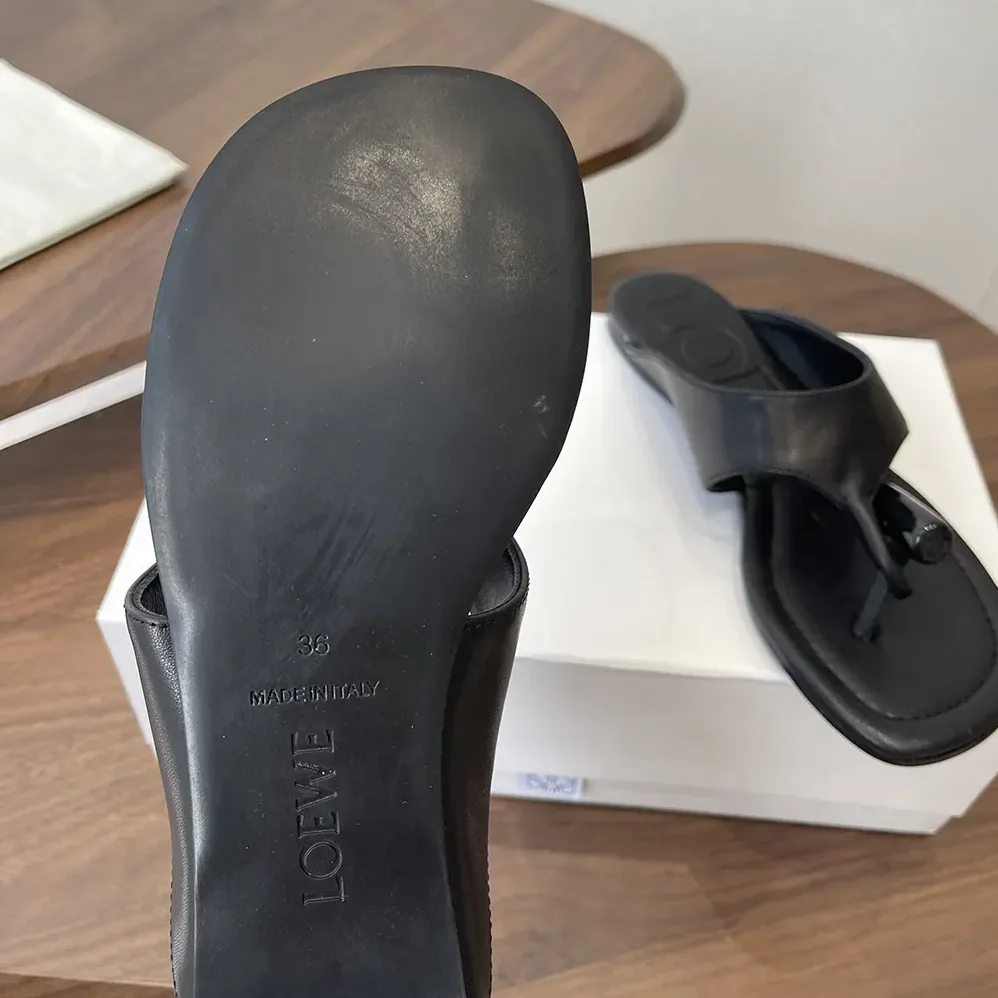 Loewe Toggle Flat Sandal in Shiny Smoot Calfskin for Women in Black Loewe Toggle Flat Sandal in Shiny Smoot Calfskin for Women in Black