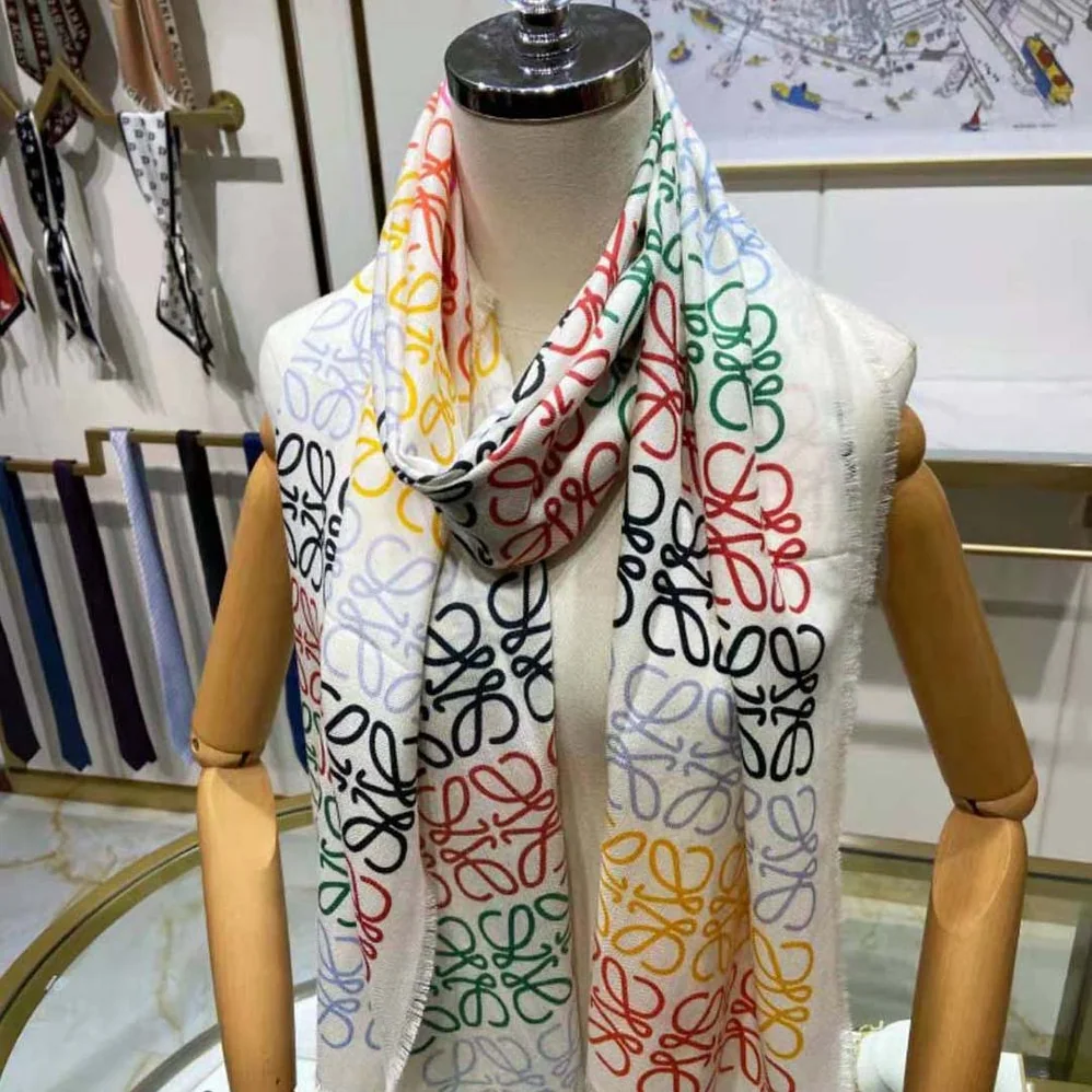 Loewe Anagram Lines Scarf in Wool and Cashmere for Women in White Loewe Anagram Lines Scarf in Wool and Cashmere for Women in White