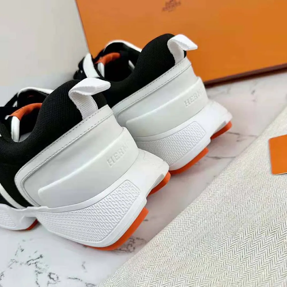 Hermes Giga Sneaker in Mesh Pique and Calfskin for Women in Black Hermes Giga Sneaker in Mesh Pique and Calfskin for Women in Black
