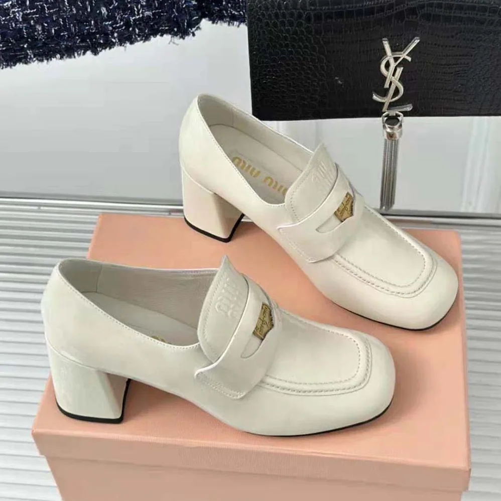 Miu Miu Patent Leather Loafers with Embossed Logo on the Tongue for Women in White Miu Miu Patent Leather Loafers with Embossed Logo on the Tongue for Women in White
