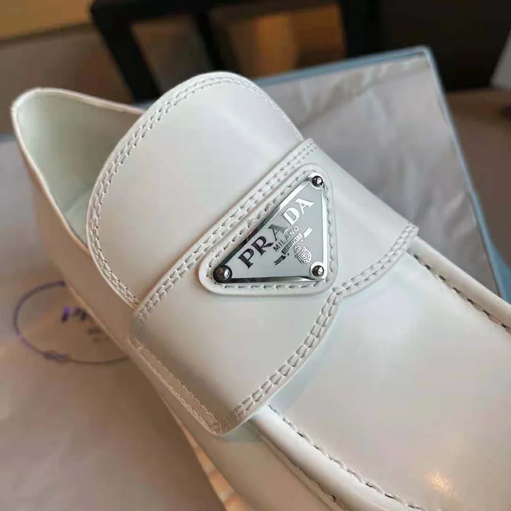 Prada Brushed Leather Loafers for Women in White Prada Brushed Leather Loafers for Women in White