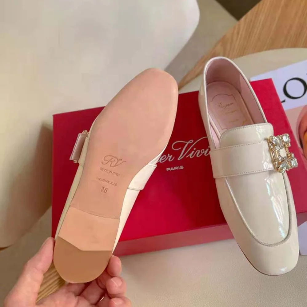 Roger Vivier Mini Broche Vivier Buckle Loafers in Patent Leather for Women in White Roger Vivier Mini Broche Vivier Buckle Loafers in Patent Leather for Women in White
