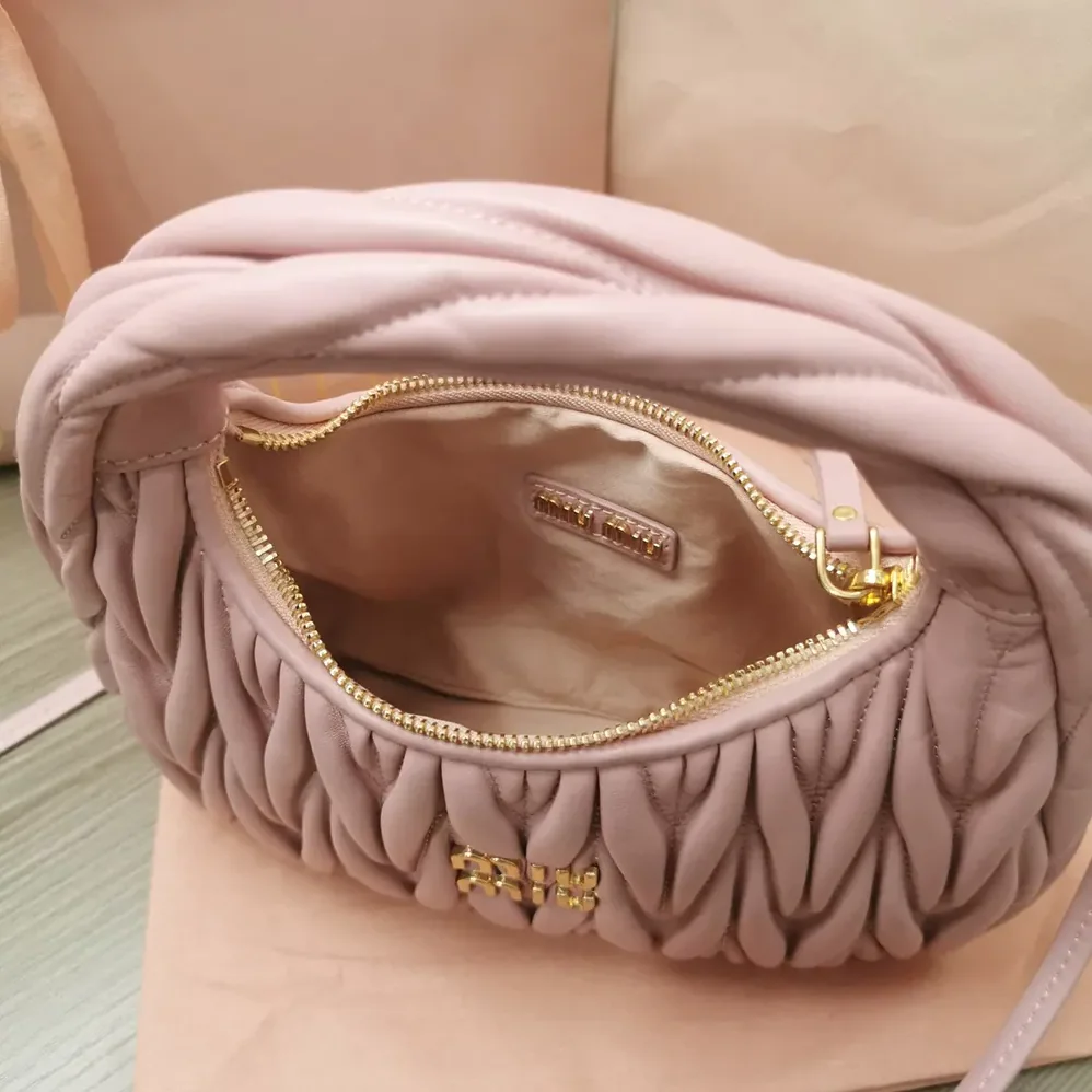 Miu Miu Wander Matelassé Nappa Leather Hobo Bag for Women in Alabaster Pink Miu Miu Wander Matelassé Nappa Leather Hobo Bag for Women in Alabaster Pink