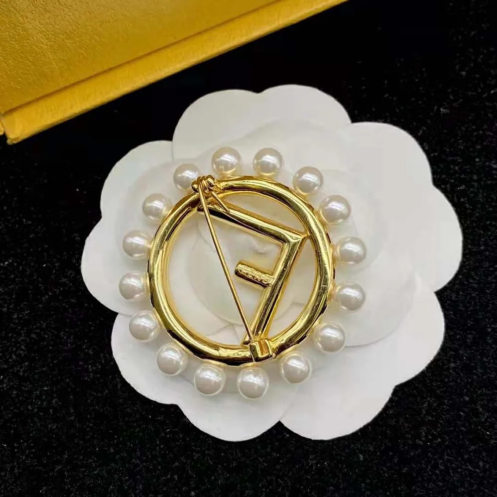 Fendi F Is Fendi Brooch Gold Colored Brooch for Women Fendi F Is Fendi Brooch Gold Colored Brooch for Women