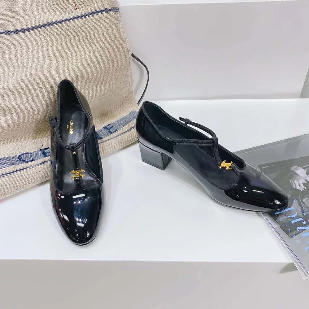 Celine Babies T-Bar Pump in Patent Calfskin and Grosgrain for Women in Black Celine Babies T-Bar Pump in Patent Calfskin and Grosgrain for Women in Black