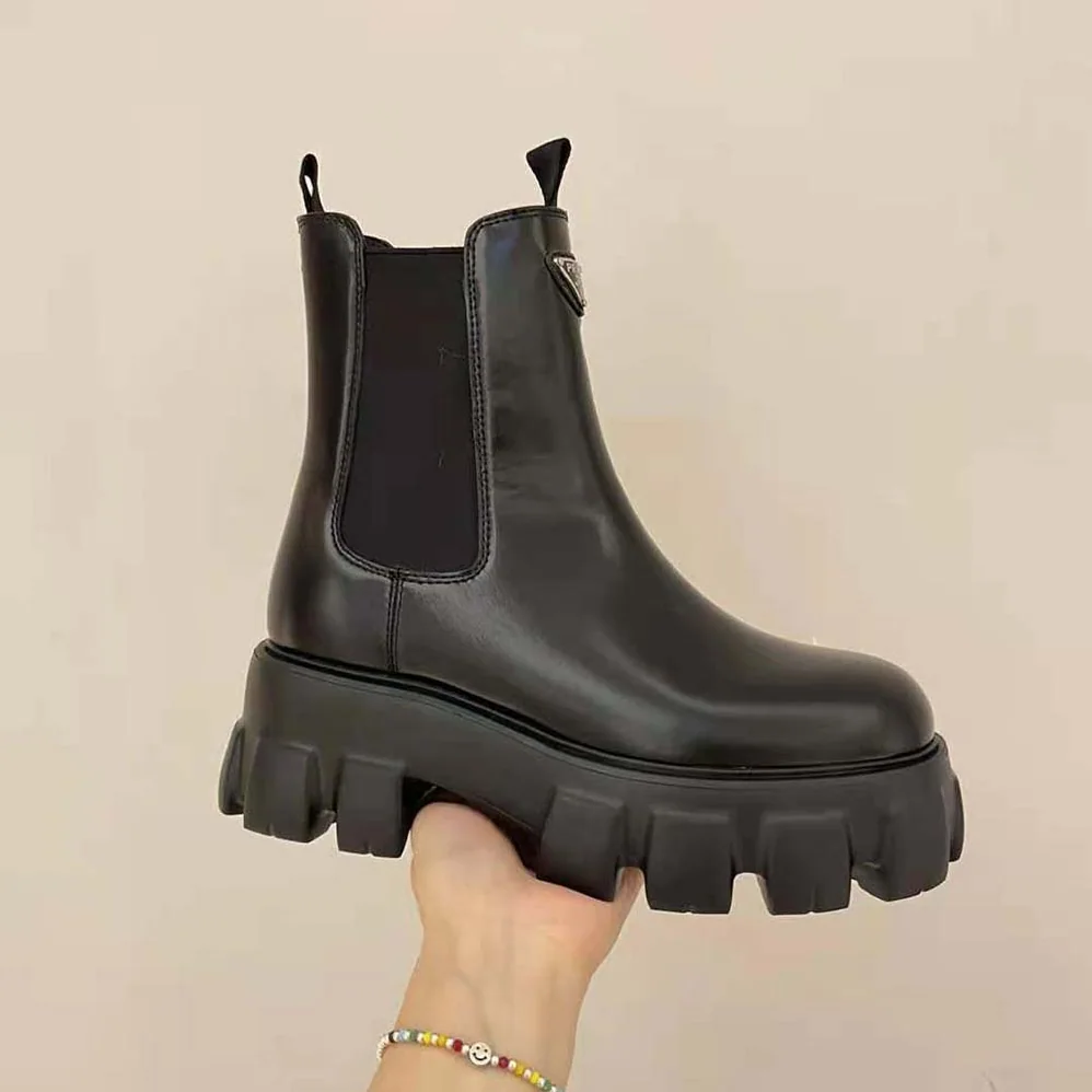 Prada Monolith Brushed Leather Booties for Women in Black