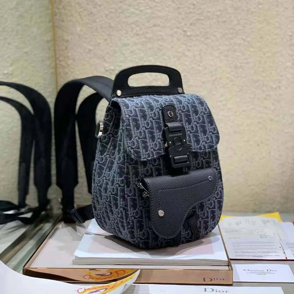 Dior Mini Saddle Backpack Dior Oblique Jacquard for Men in Black Dior Mini Saddle Backpack Dior Oblique Jacquard for Men in Black