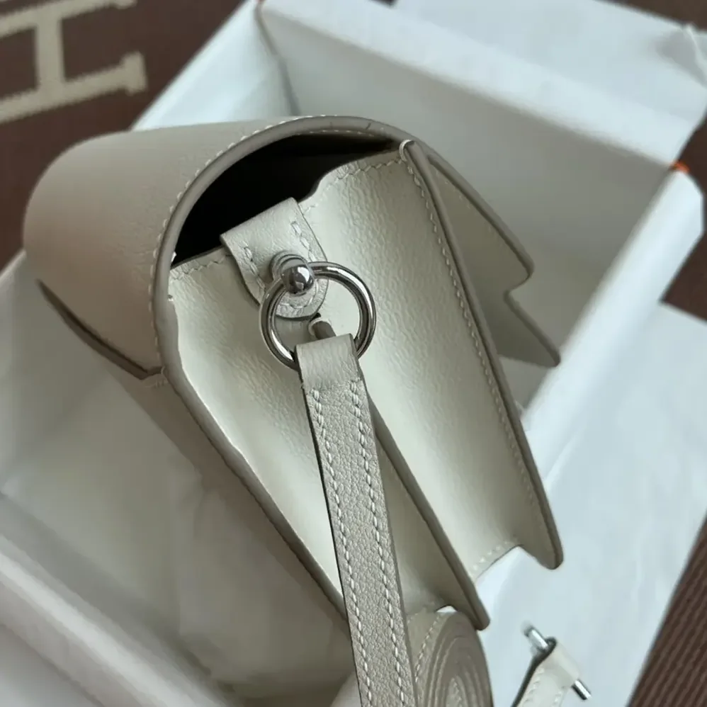 Hermes Roulis Mini Bag in Evercolor Calfskin for Women in White/Silver Hermes Roulis Mini Bag in Evercolor Calfskin for Women in White/Silver