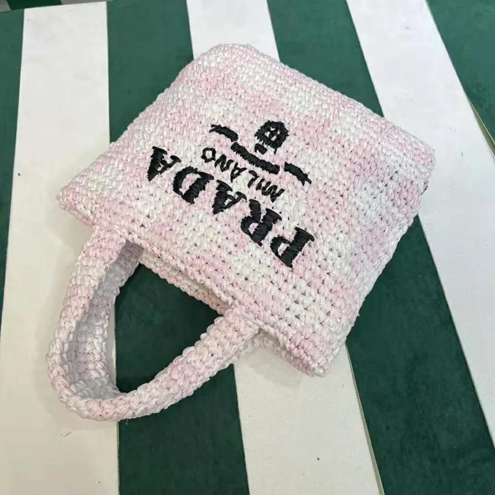 Prada Small Crochet Tote Bag with Embroidered Lettering Logo for Women in Pink Prada Small Crochet Tote Bag with Embroidered Lettering Logo for Women in Pink