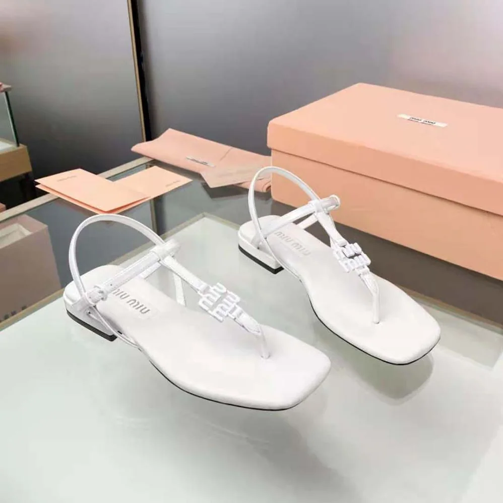 Miu Miu Patent Thong Sandals with Metal Lettering Logo for Women in White Miu Miu Patent Thong Sandals with Metal Lettering Logo for Women in White