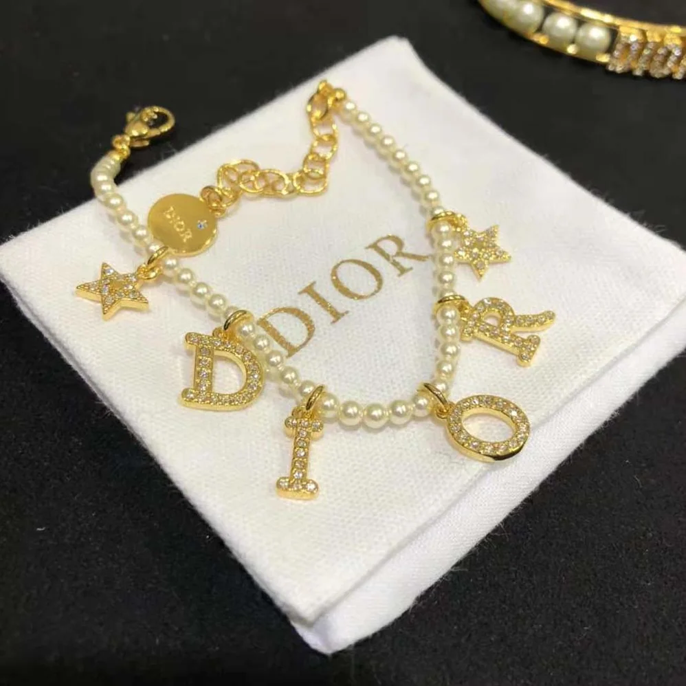 Dior Dio(r)evolution Bracelet Gold-Finish Metal White Resin Pearls and White Crystals for Women Dior Dio(r)evolution Bracelet Gold-Finish Metal White Resin Pearls and White Crystals for Women