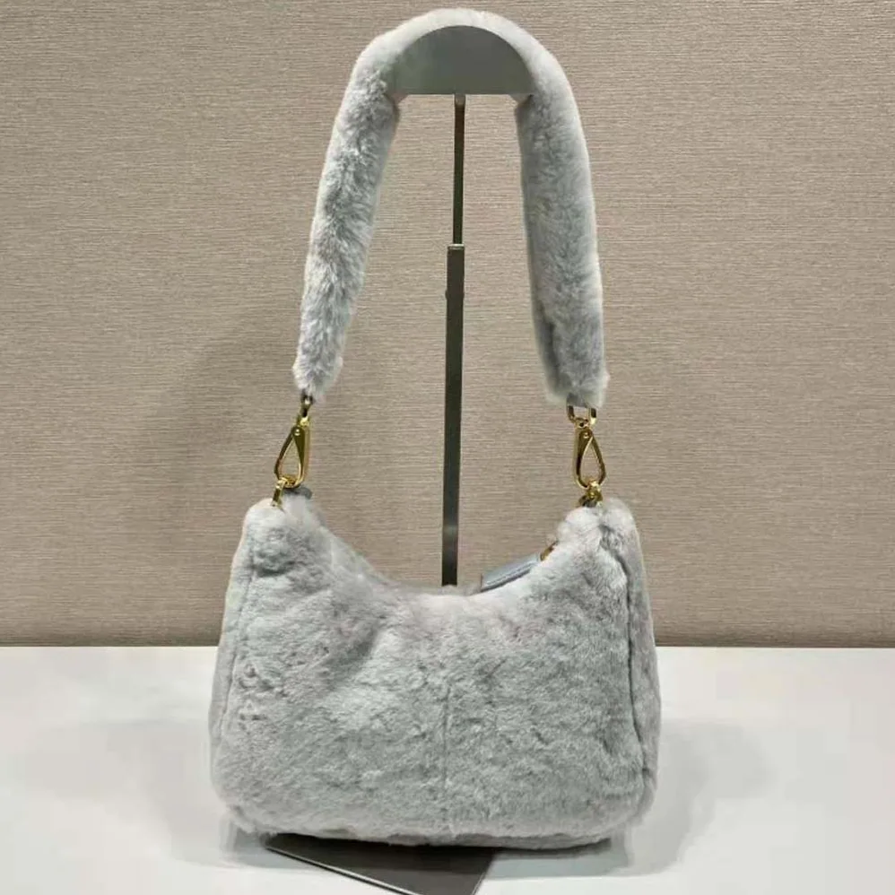 Prada Shearling Mini-Bag with the Enameled Metal Triangle Logo for Women in Silver