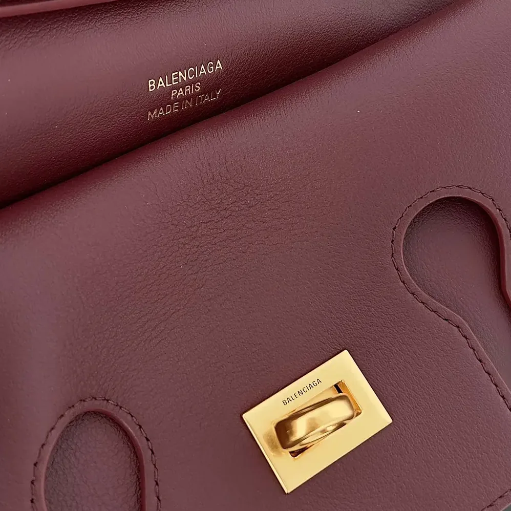 Balenciaga Bel Air Clutch On Strap Small in Dark Burgundy for Women Balenciaga Bel Air Clutch On Strap Small in Dark Burgundy for Women