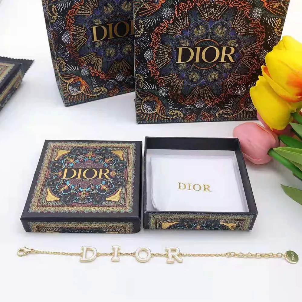 Dior Dio(r)evolution Bracelet Gold-Finish Metal and White Lacquer for Women Dior Dio(r)evolution Bracelet Gold-Finish Metal and White Lacquer for Women