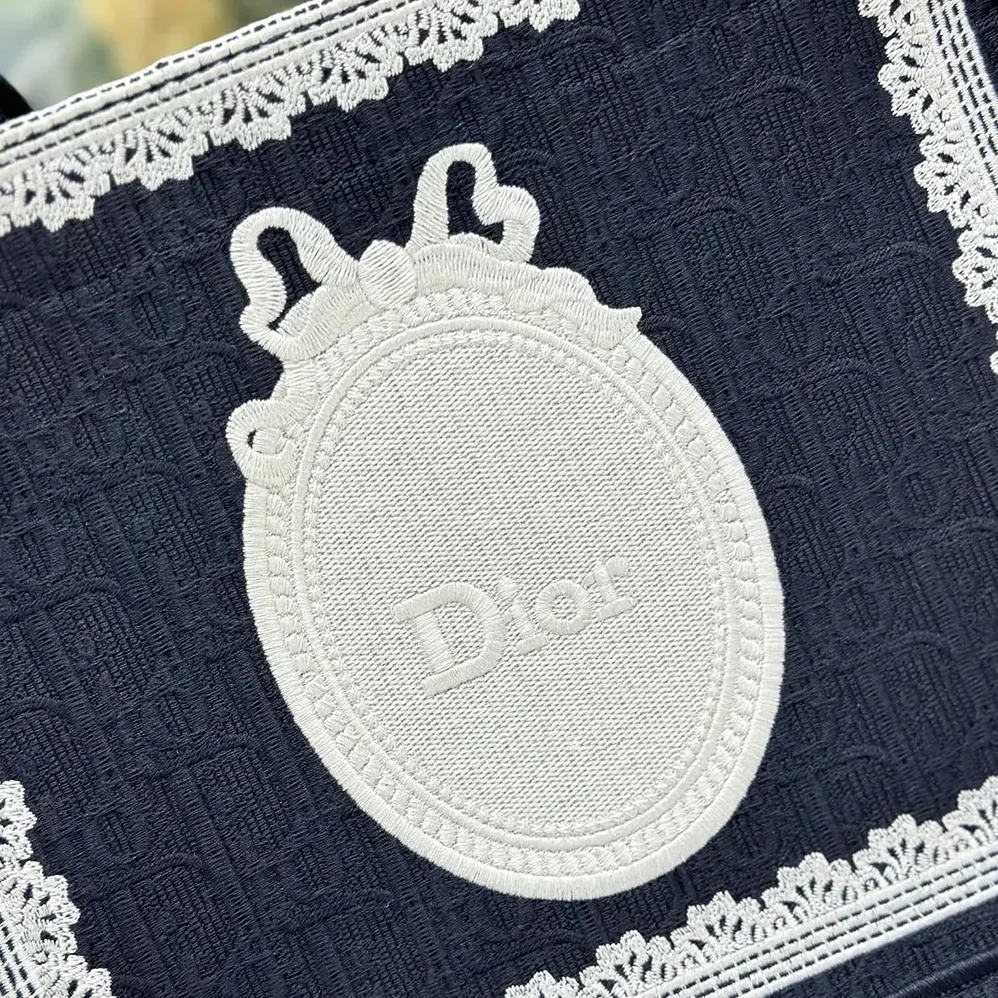 Dior Small Dior Book Tote with Strap Blue Dior Oblique Embroidery with White Lace and Dior Médaillon for Women Dior Small Dior Book Tote with Strap Blue Dior Oblique Embroidery with White Lace and Dior Médaillon for Women