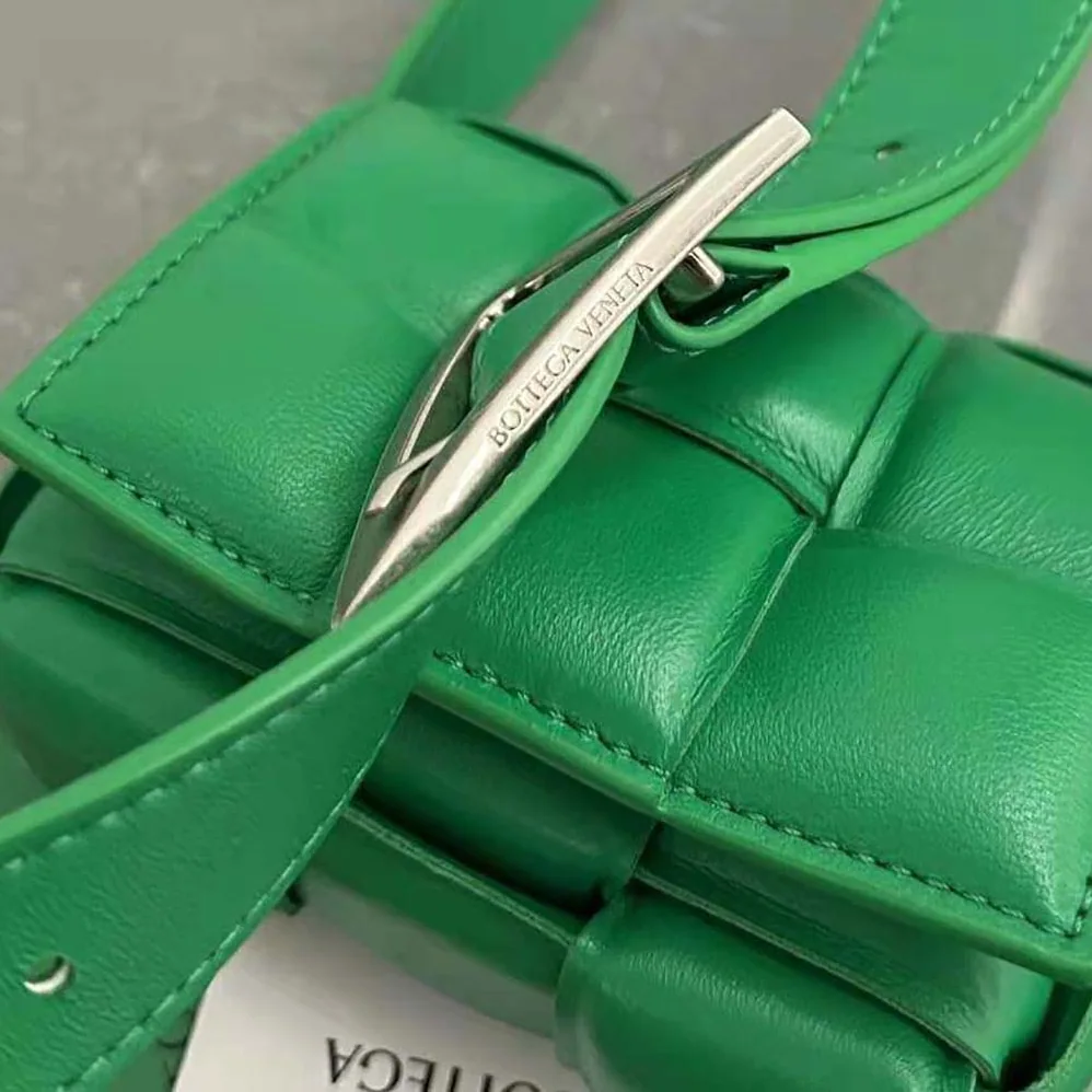 Bottega Veneta Candy Padded Cassette Mini Padded Intreccio Leather Cross-Body Bag for Women in Green Bottega Veneta Candy Padded Cassette Mini Padded Intreccio Leather Cross-Body Bag for Women in Green