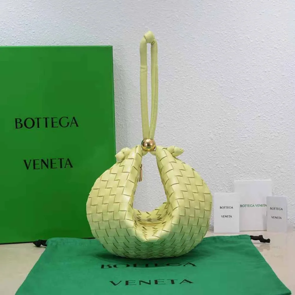 Bottega Veneta Turn Medium Intrecciato Leather Pouch with Adjustable Strap for Women in Yellow Bottega Veneta Turn Medium Intrecciato Leather Pouch with Adjustable Strap for Women in Yellow