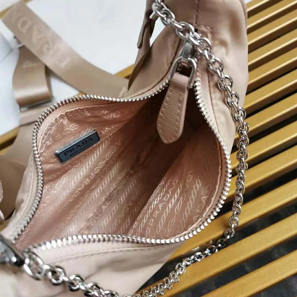 Prada Prada Re-Edition 2005 Nylon Bag for Women in Pink Prada Prada Re-Edition 2005 Nylon Bag for Women in Pink
