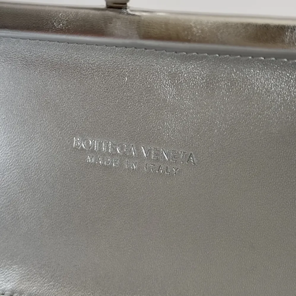 Bottega Veneta Knot Pressed Intreccio Laminated Leather Minaudiere for Women in Silver Bottega Veneta Knot Pressed Intreccio Laminated Leather Minaudiere for Women in Silver