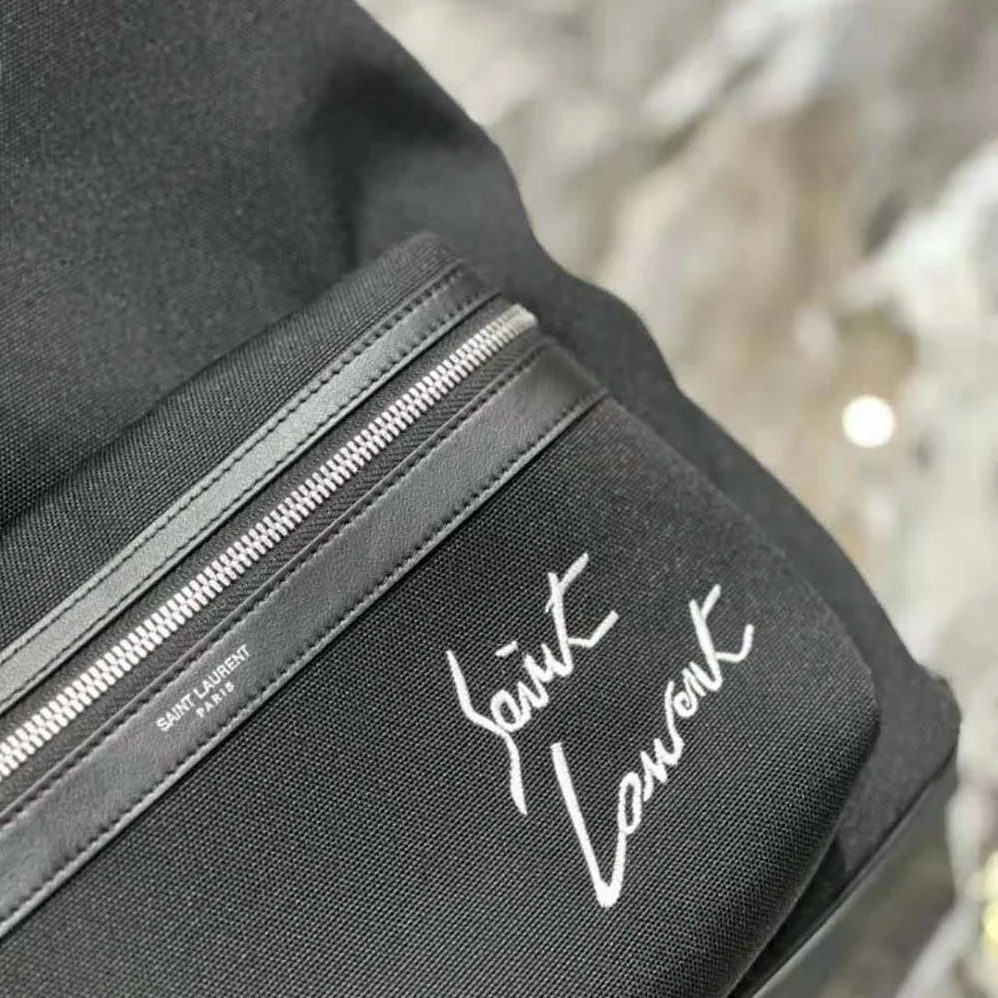 Saint Laurent YSL Saint Laurent Embroidered City Backpack in Canvas for Women Saint Laurent YSL Saint Laurent Embroidered City Backpack in Canvas for Women