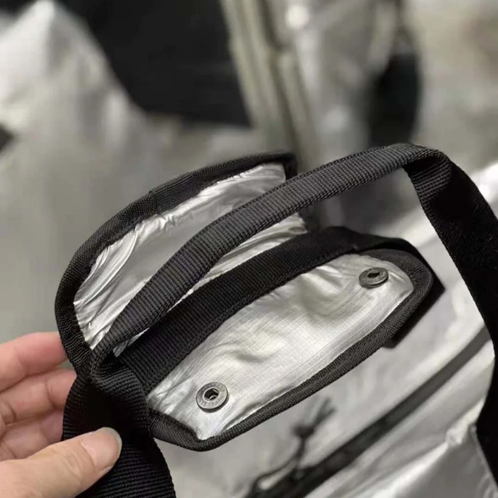 Saint Laurent YSL Nuxx Duffle in Metallized Nylon for Men in Silver Saint Laurent YSL Nuxx Duffle in Metallized Nylon for Men in Silver