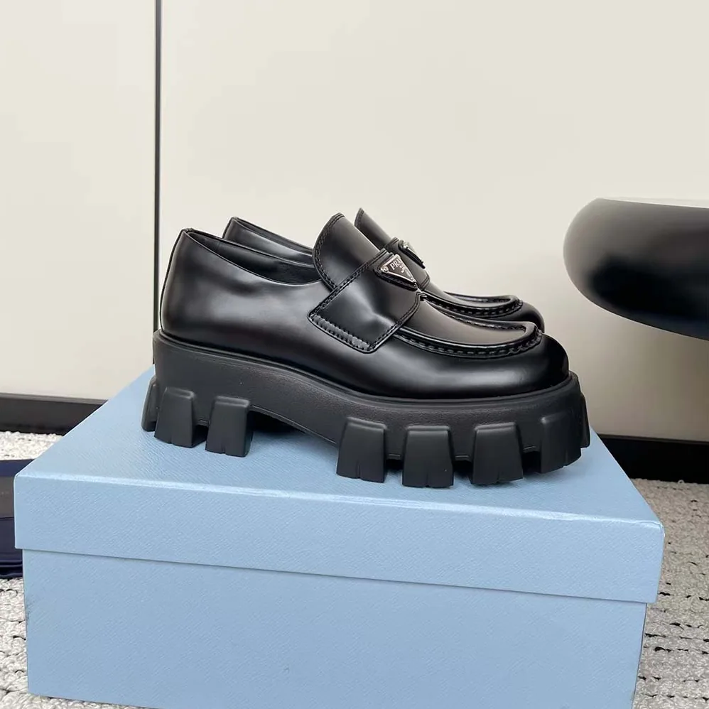 Prada Brushed Leather Monolith Loafers for Unisex in Black