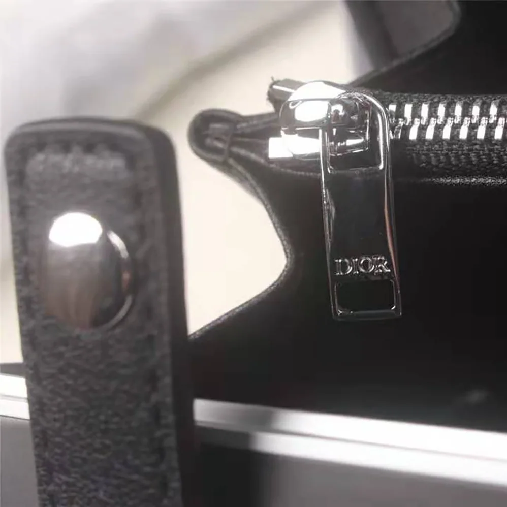 Dior Dior and Rimowa Personal Clutch Aluminum and Grained Calfskin for Men in Black Dior Dior and Rimowa Personal Clutch Aluminum and Grained Calfskin for Men in Black