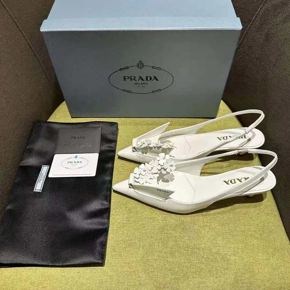 Prada Brushed Leather Slingback Pumps with Floral Appliques for Women in White Prada Brushed Leather Slingback Pumps with Floral Appliques for Women in White