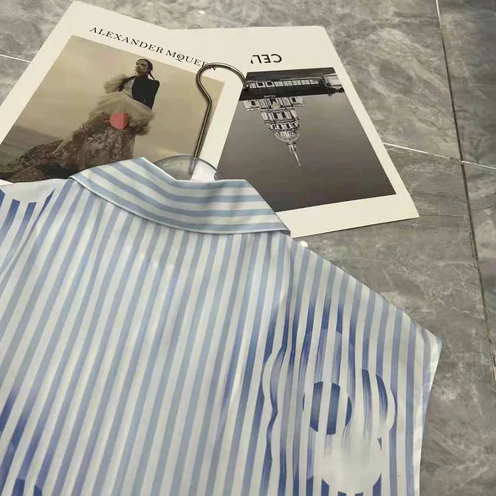 Prada Sleeveless Printed Poplin Shirt for Women in Blue Prada Sleeveless Printed Poplin Shirt for Women in Blue