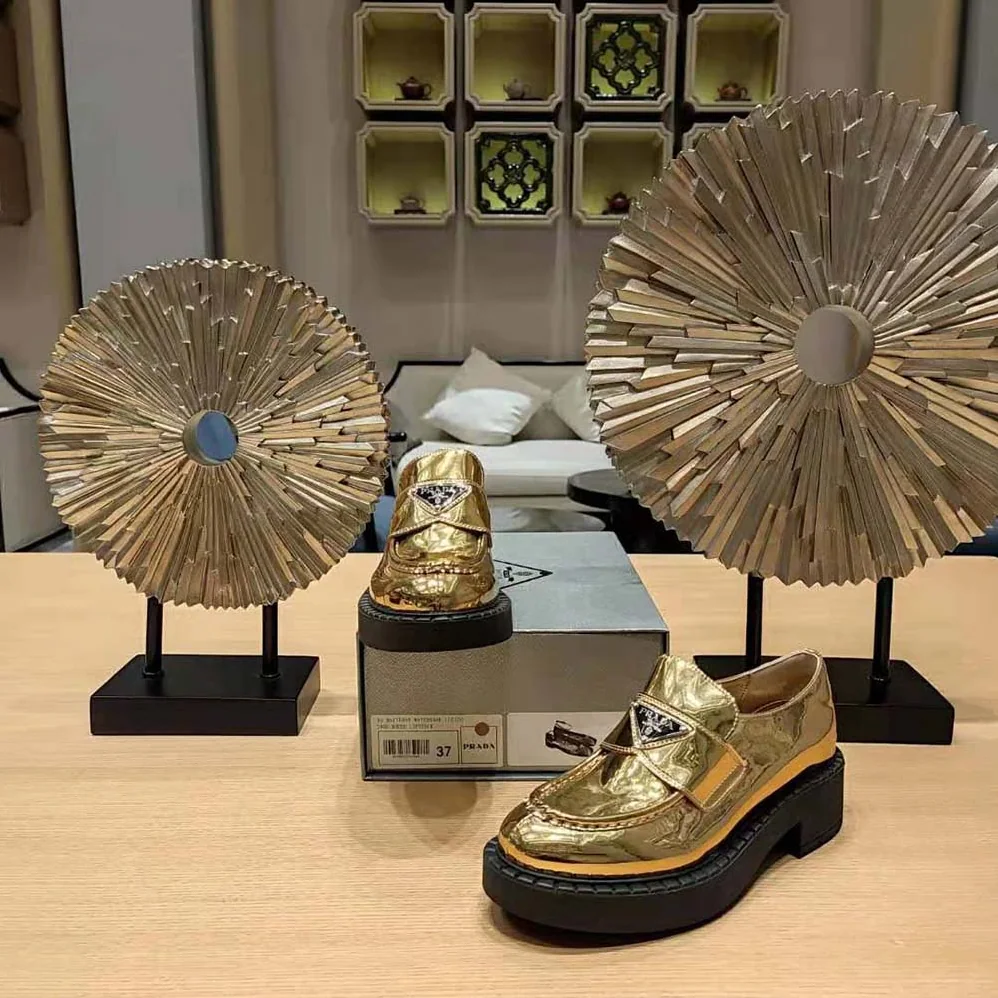 Prada Metallic Leather Loafers for Women in Gold