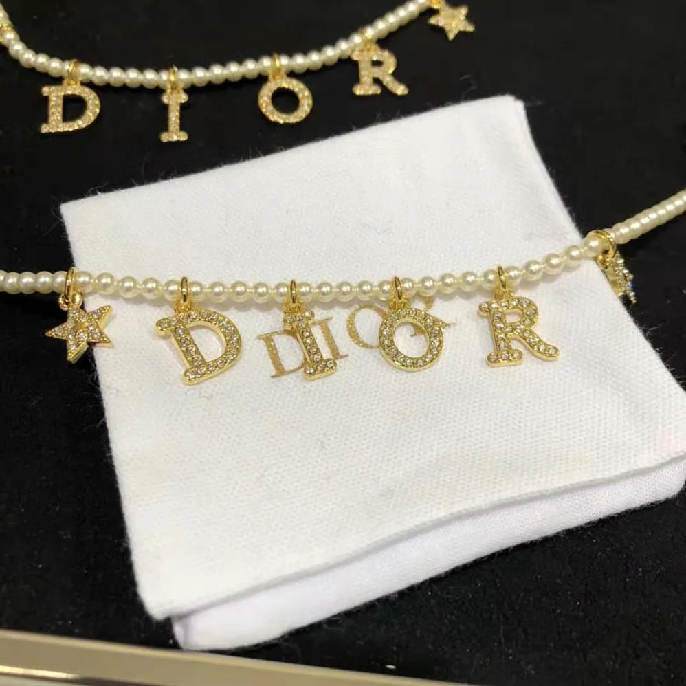 Dior Dio(r)evolution Bracelet Gold-Finish Metal White Resin Pearls and White Crystals for Women Dior Dio(r)evolution Bracelet Gold-Finish Metal White Resin Pearls and White Crystals for Women