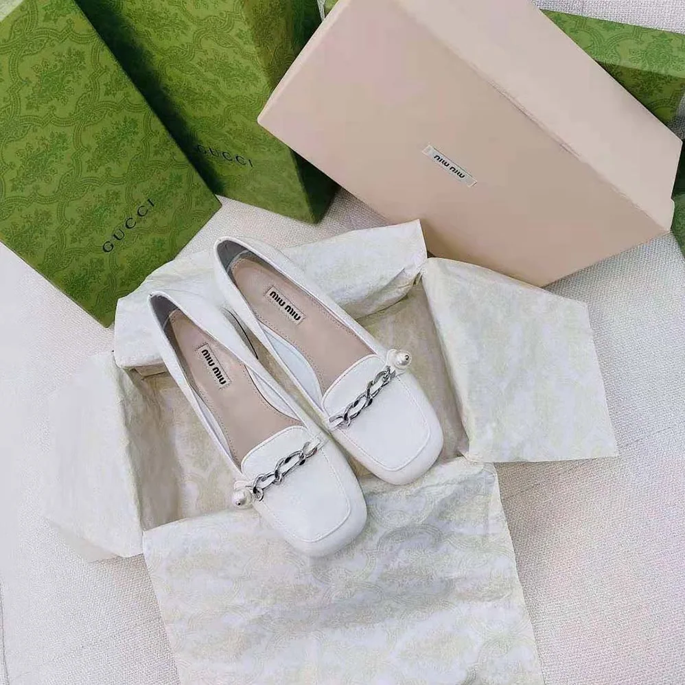 Miu Miu Patent Leather Loafers in 35mm Heel for Women in White Miu Miu Patent Leather Loafers in 35mm Heel for Women in White