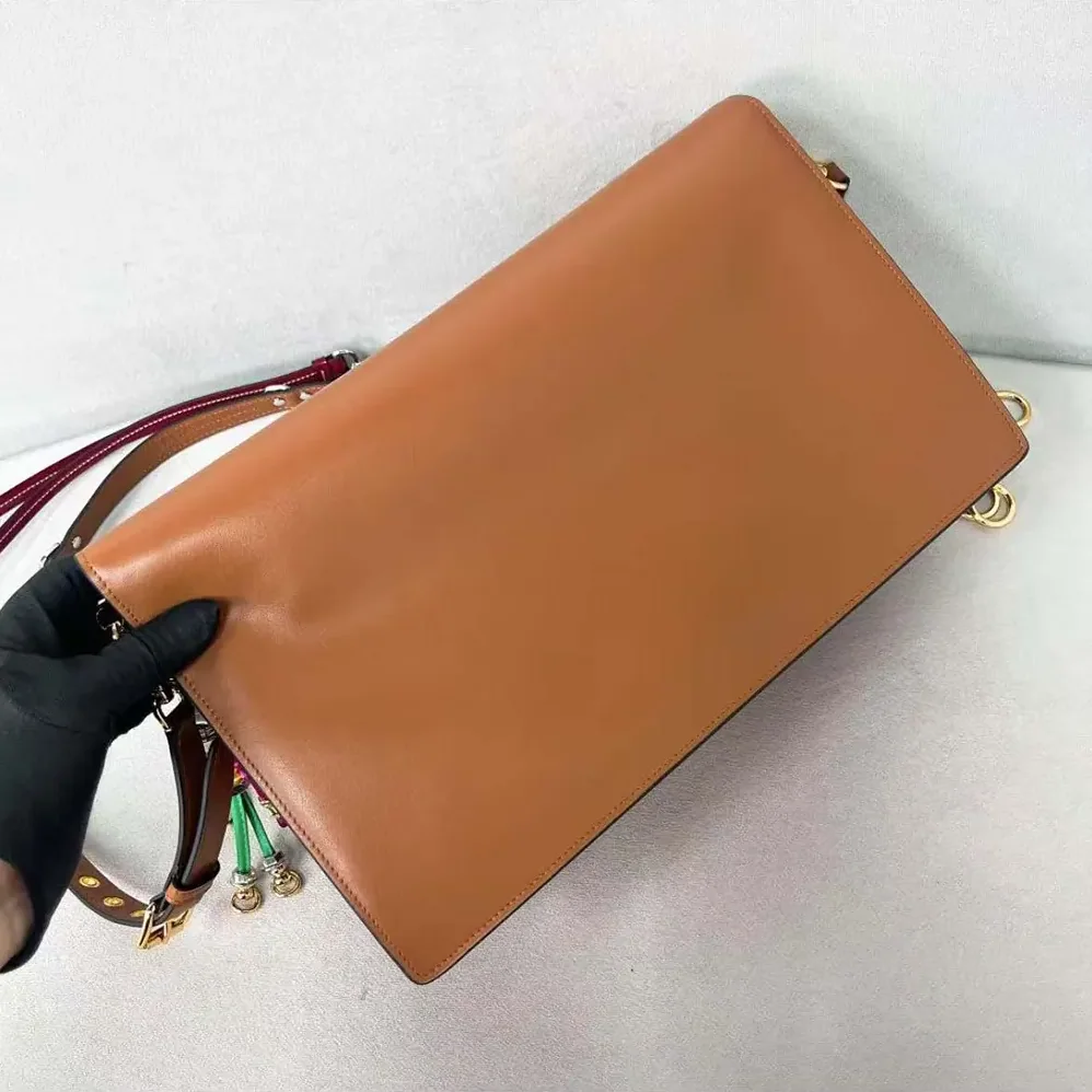 Prada Soft Sound Large Leather Shoulder Bag with Charms for Women in Brown