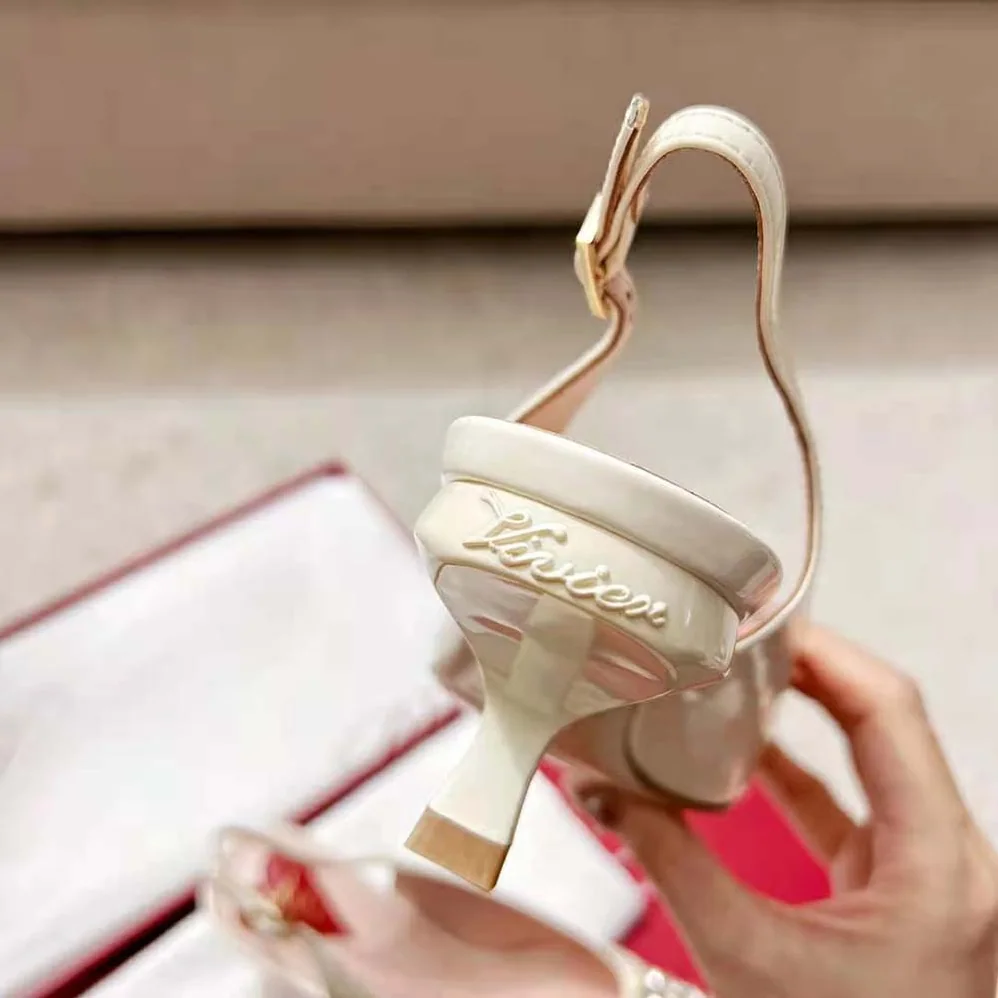 Roger Vivier Virgule Strass Buckle Slingback Pumps in Patent Leather for Women in White Roger Vivier Virgule Strass Buckle Slingback Pumps in Patent Leather for Women in White