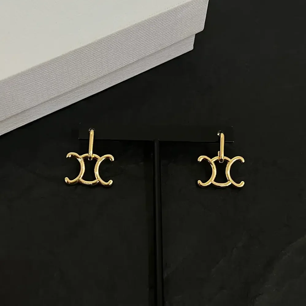 Celine Triomphe Lock Earrings in Brass with Gold Finish for Women in Gold Celine Triomphe Lock Earrings in Brass with Gold Finish for Women in Gold
