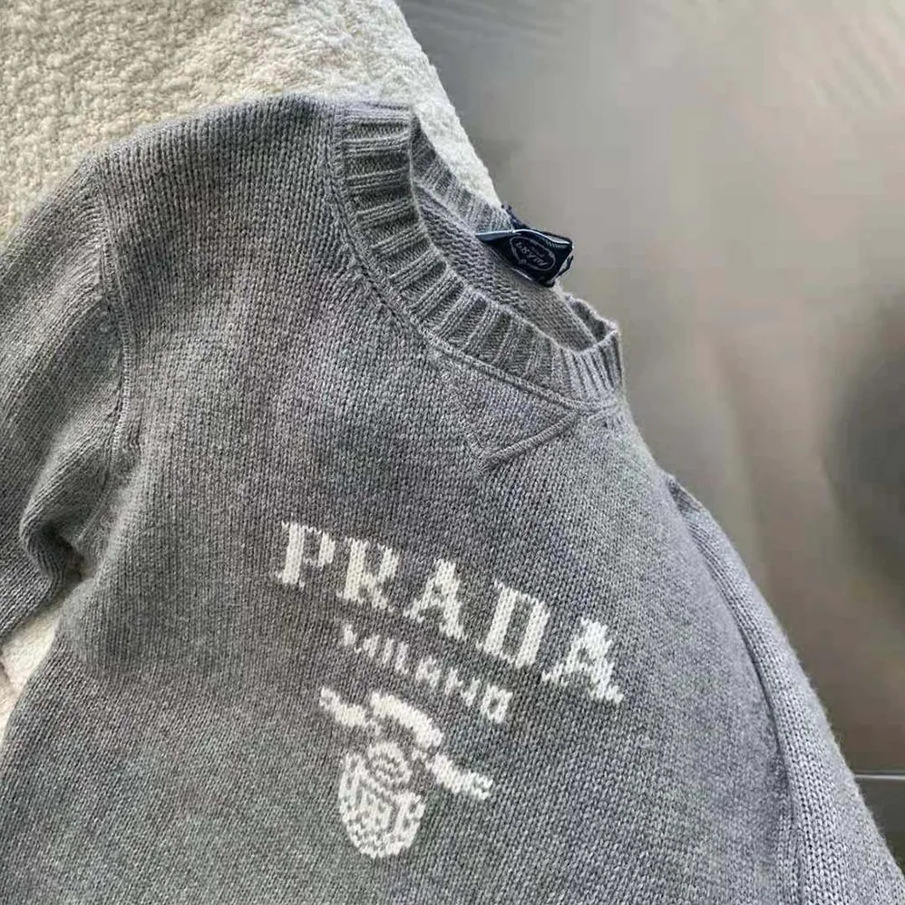Prada Cashmere and Wool Prada Logo Crew-Neck Sweater for Women in Silver Prada Cashmere and Wool Prada Logo Crew-Neck Sweater for Women in Silver