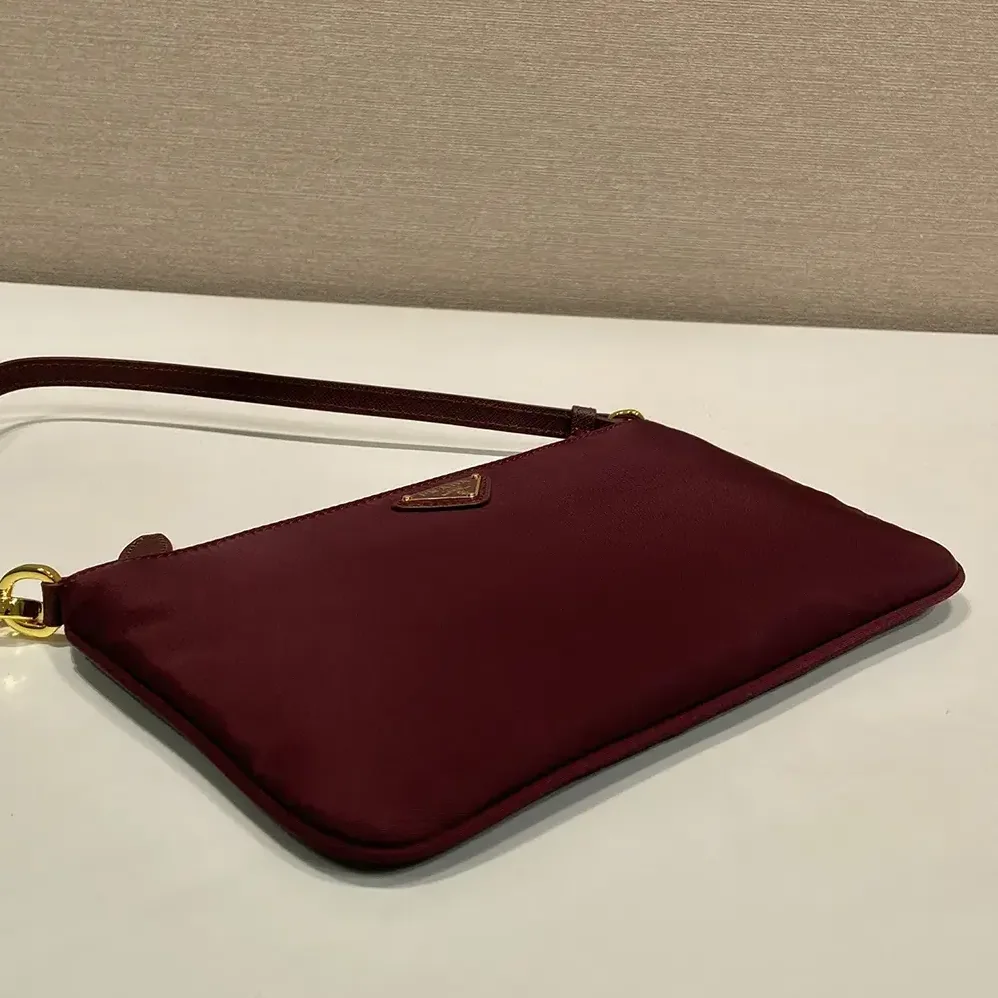 Prada Re-Nylon Pouch Enameled Metal Triangle Logo for Women Prada Re-Nylon Pouch Enameled Metal Triangle Logo for Women
