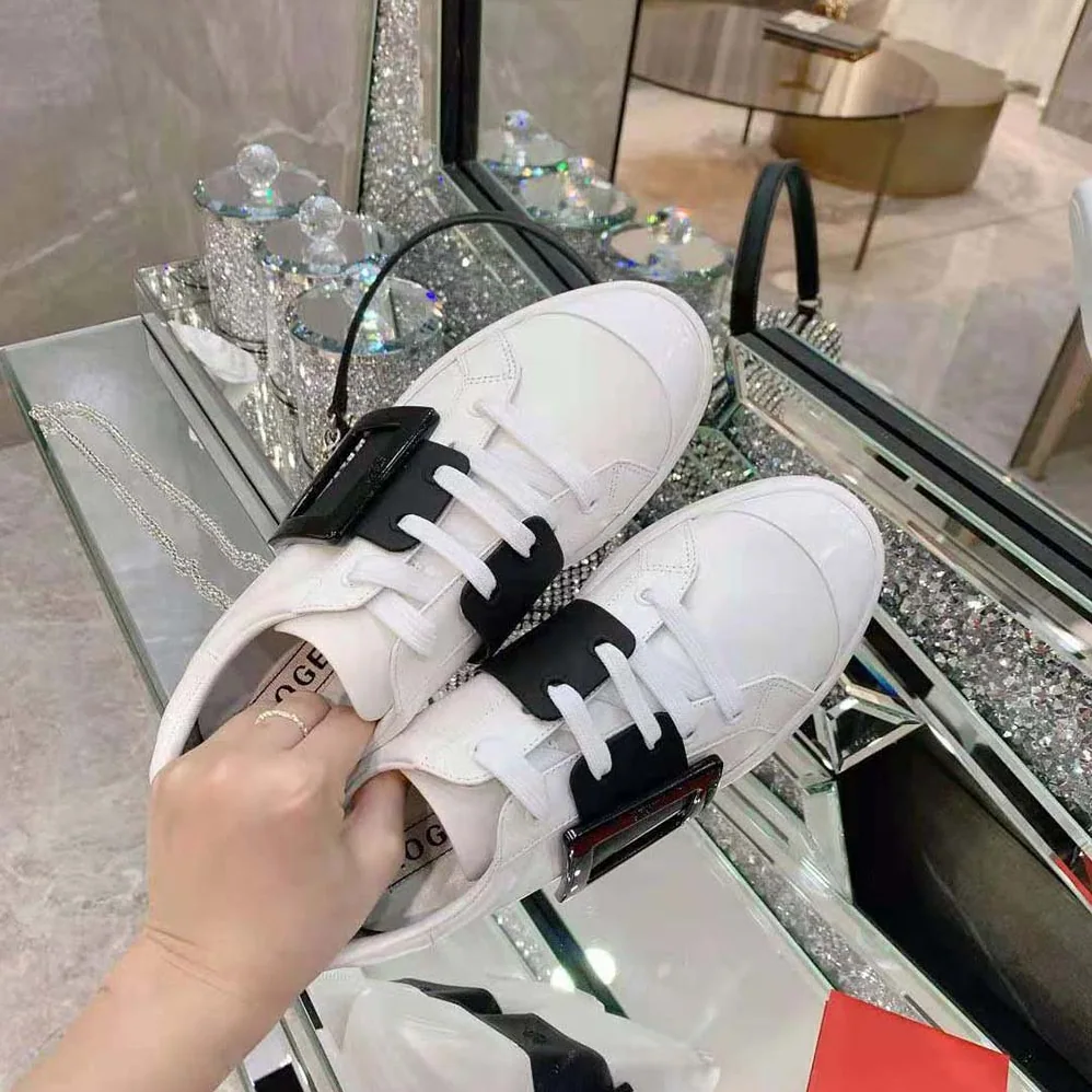 Roger Vivier Viv Skate Lacquered Buckle Sneakers in Soft Leather for Women in Black Roger Vivier Viv Skate Lacquered Buckle Sneakers in Soft Leather for Women in Black