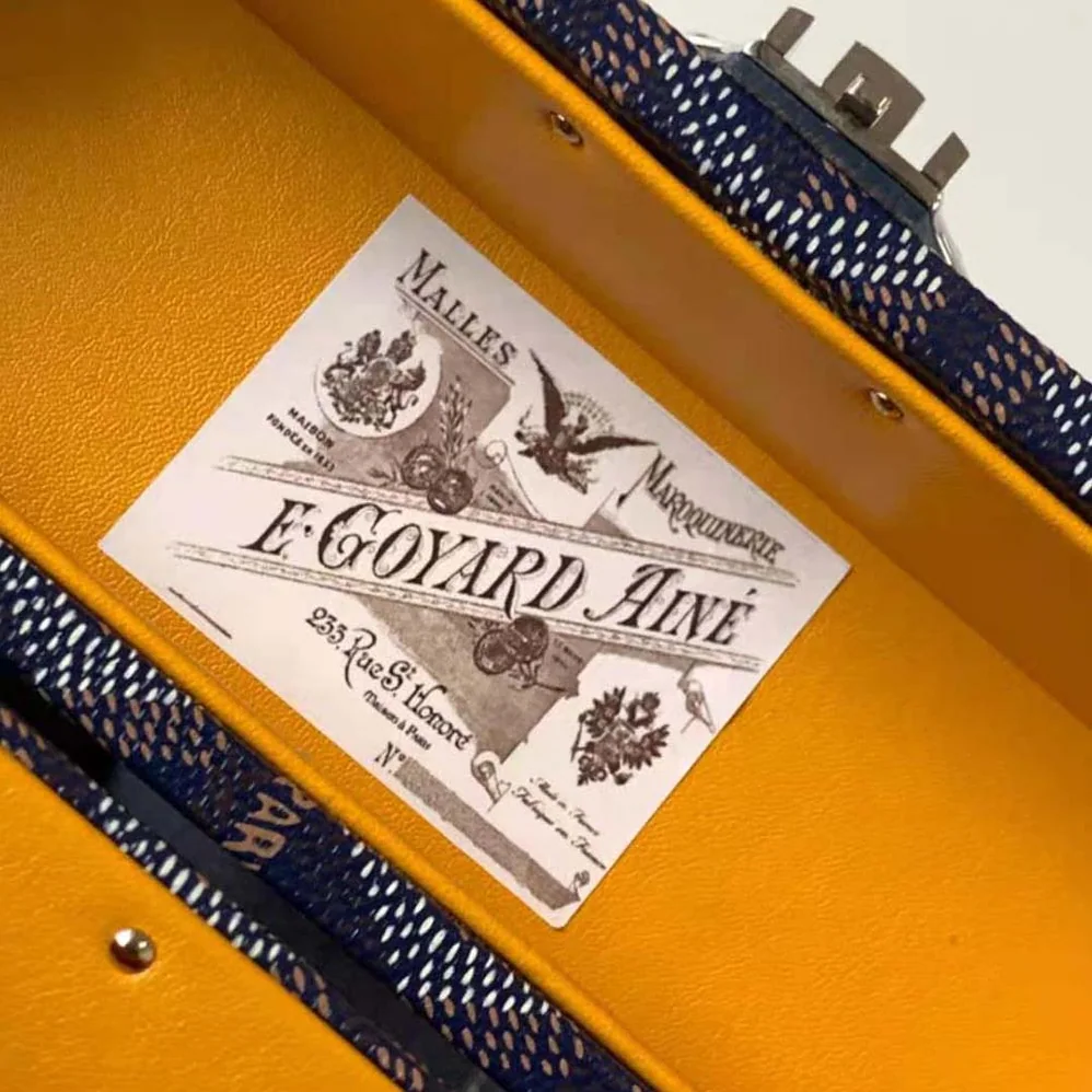 Goyard Cassette Trunk Bag in Goyardine Canvas & Clamecy Cowhide for Women in Navy Goyard Cassette Trunk Bag in Goyardine Canvas & Clamecy Cowhide for Women in Navy