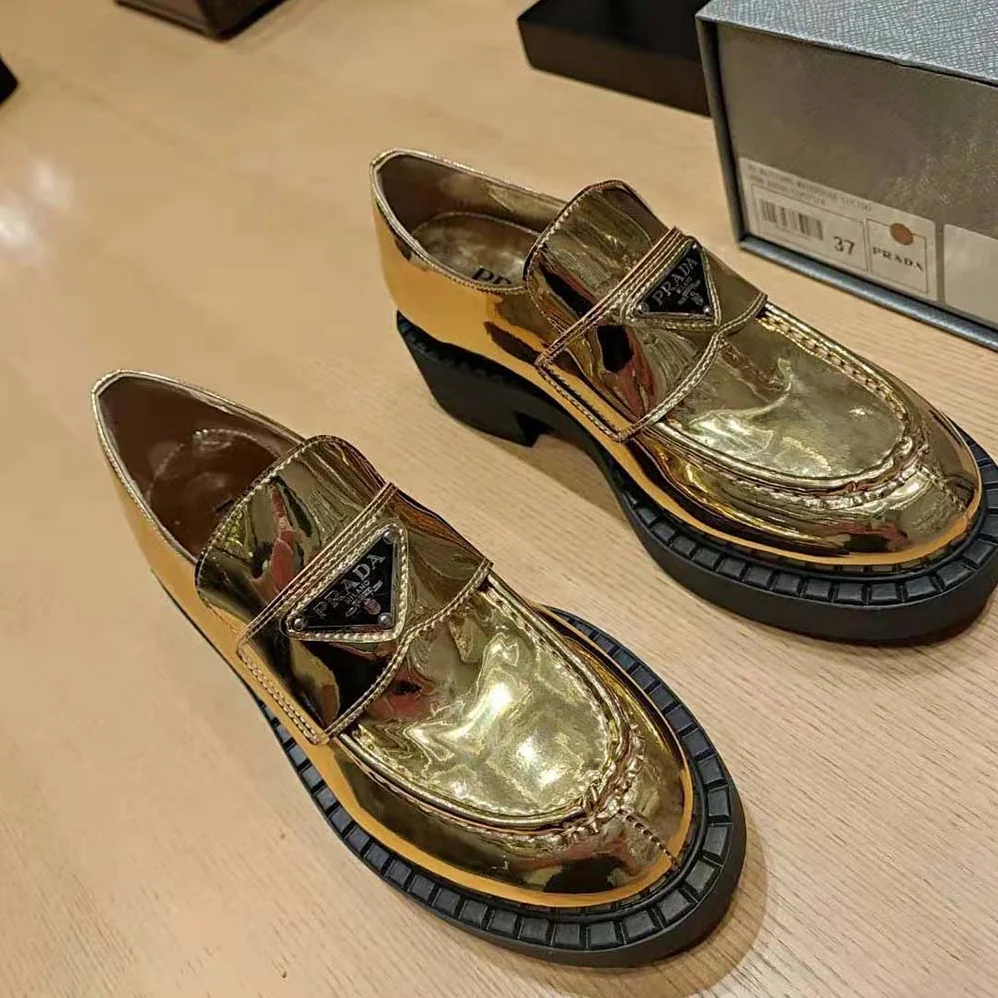 Prada Metallic Leather Loafers for Women in Gold
