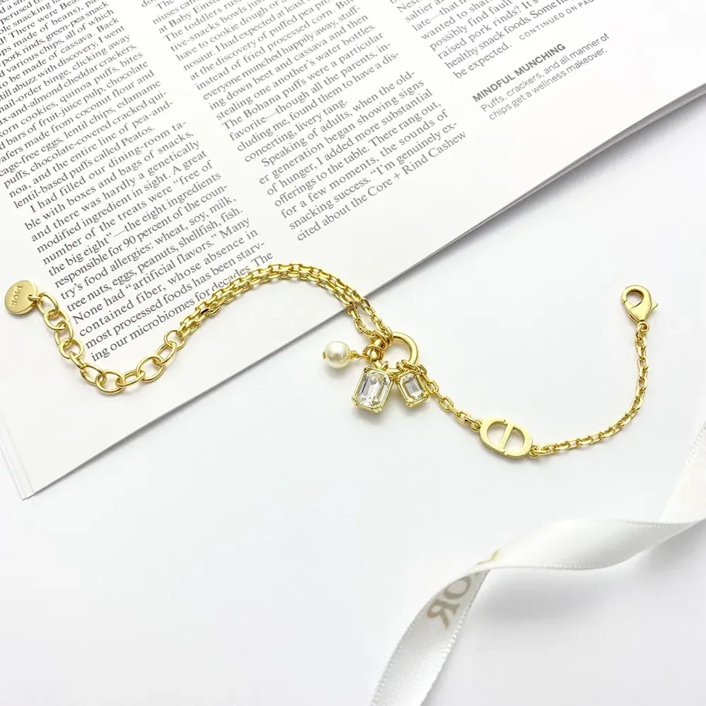 Dior Petit CD Bracelet Gold-Finish Metal with a White Resin Pearl and Silver for Women in Tone Crystals Dior Petit CD Bracelet Gold-Finish Metal with a White Resin Pearl and Silver for Women in Tone Crystals