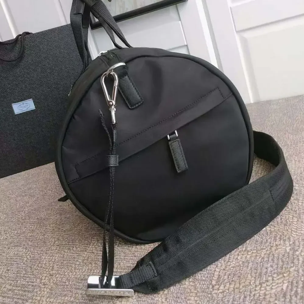 Prada Re-Nylon and Saffiano Leather Duffle Bag for Unisex in Black