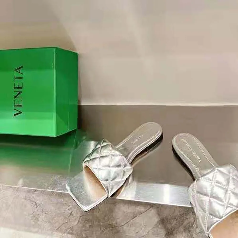 Bottega Veneta Lido Flat Sandal Intreccio Metallised Leather Flat Sandals for Women in Silver