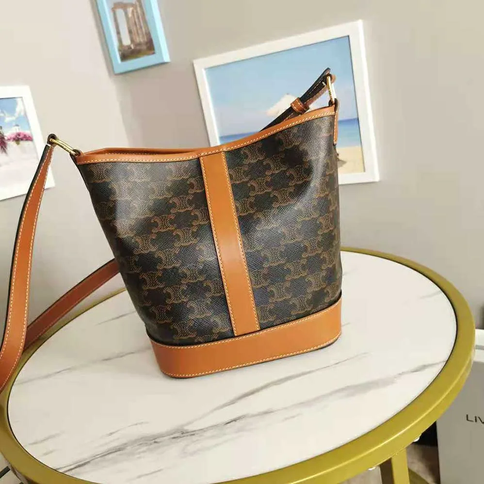 Celine Small Bucket in Triomphe Canvas for Women in Brown Celine Small Bucket in Triomphe Canvas for Women in Brown