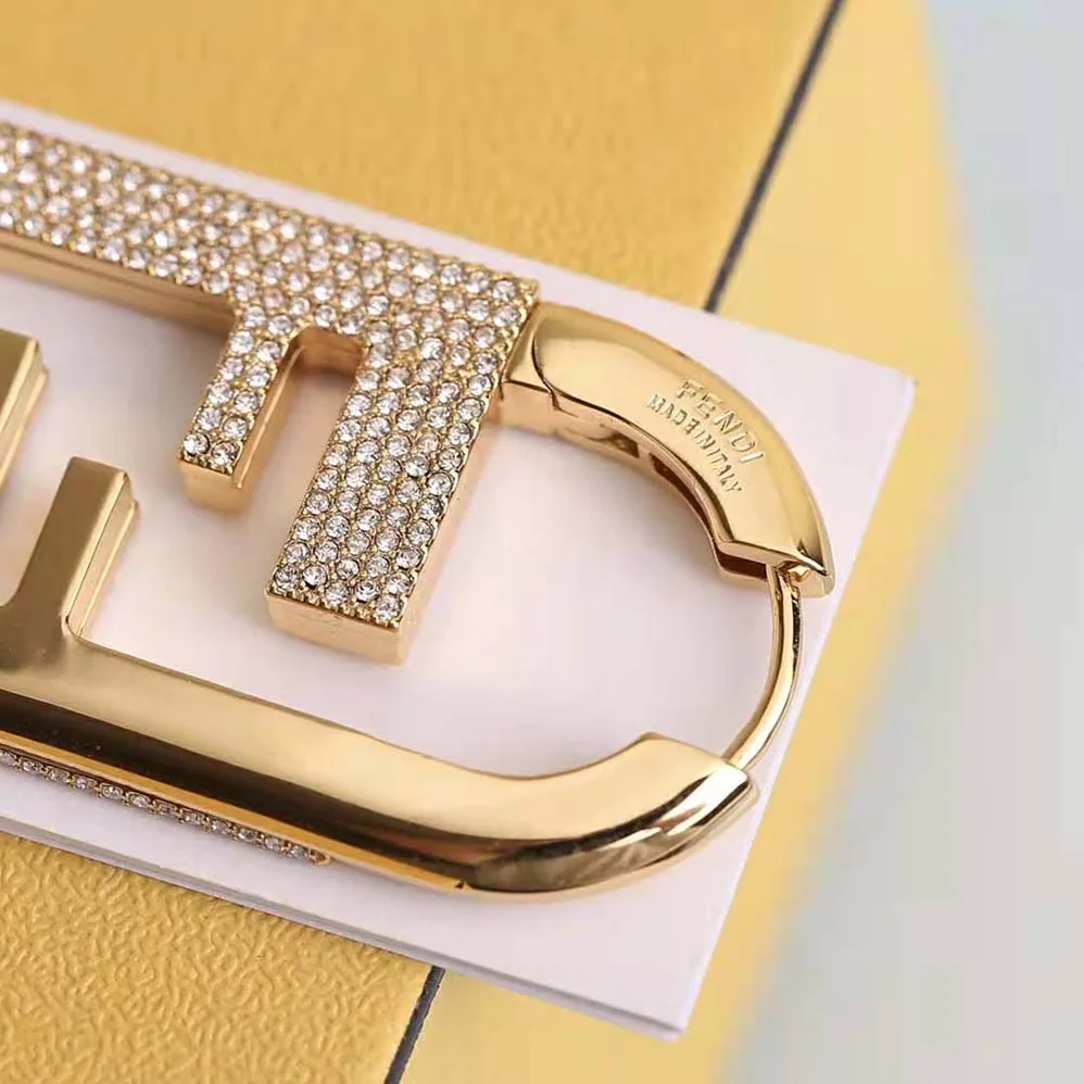 Fendi O'lock Single Earring with Gold for Women in color Earrings