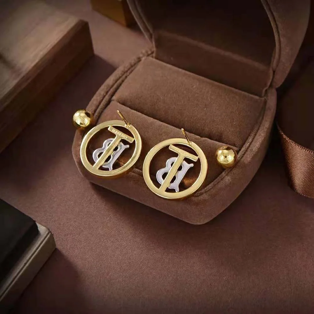 Burberry Gold and Palladium for Women in plated Monogram Motif Earrings Burberry Gold and Palladium for Women in plated Monogram Motif Earrings