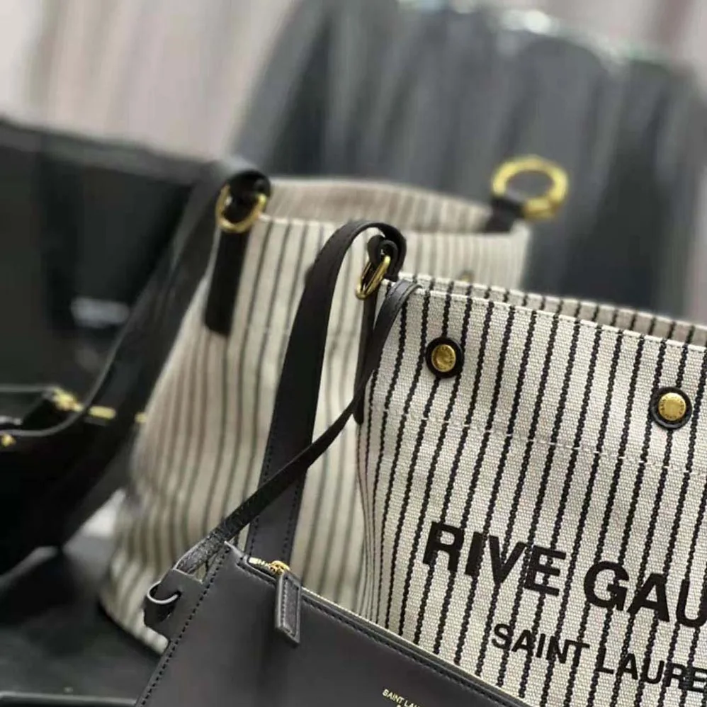 Saint Laurent YSL Rive Gauche Bucket Bag in Striped Canvas and Leather for Women Saint Laurent YSL Rive Gauche Bucket Bag in Striped Canvas and Leather for Women