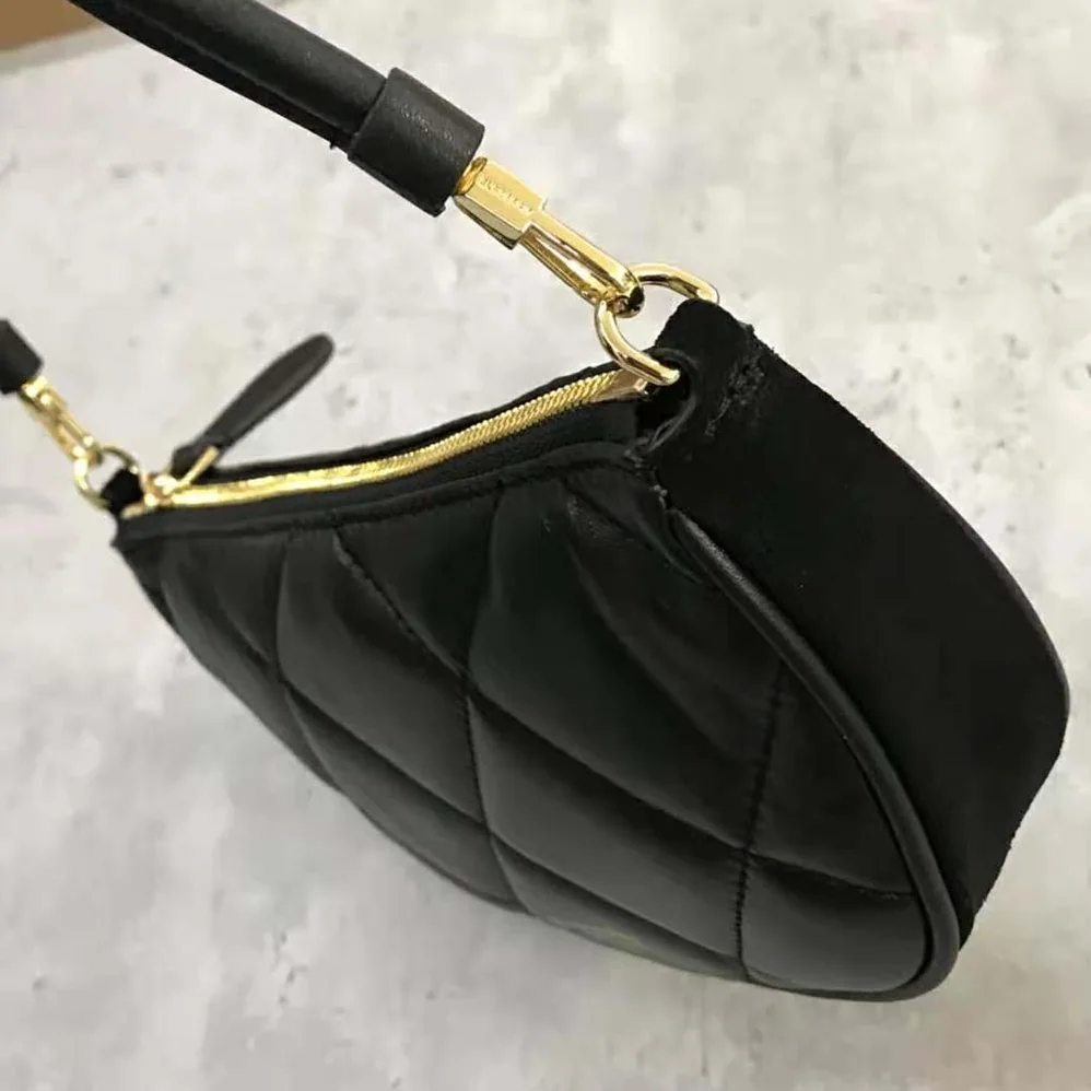 Burberry Quilted Lambskin Olympia Pouch for Women in Black Burberry Quilted Lambskin Olympia Pouch for Women in Black