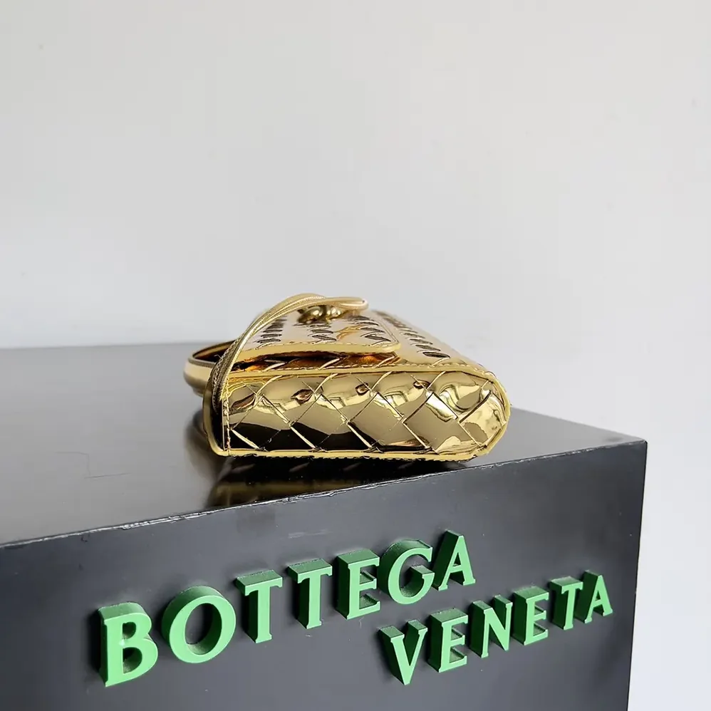 Bottega Veneta Andiamo Clutch in Intrecciato Leather for Women in Gold Bottega Veneta Andiamo Clutch in Intrecciato Leather for Women in Gold